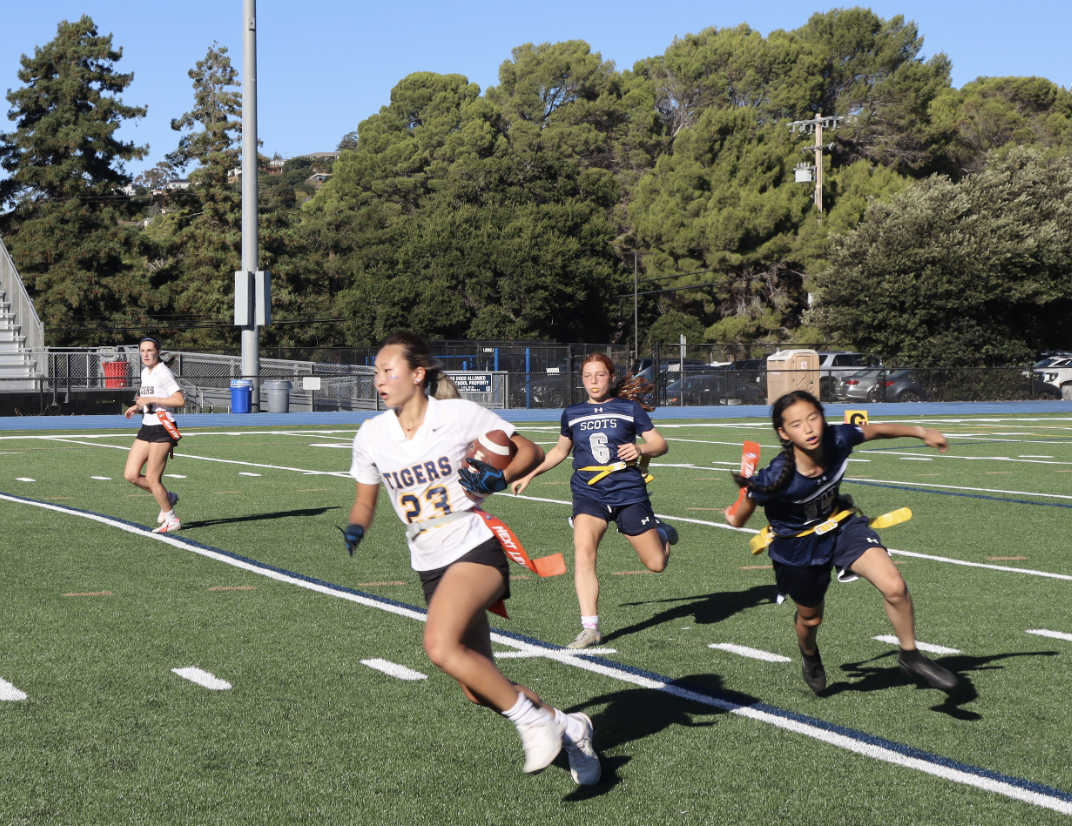 Running+Back+Hailey+Truong+%E2%80%9826+runs+for+a+first+down+in+a+scrimmage+against+Carlmont+HS.